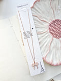 YJ-P41554 | Pearl Bow Tie Necklace Rose gold |